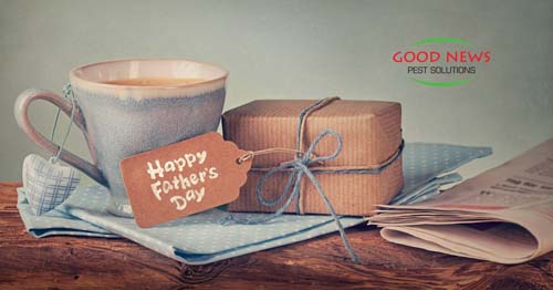 Father's Day scene with a gift box, a cup of coffee, and a newspaper.